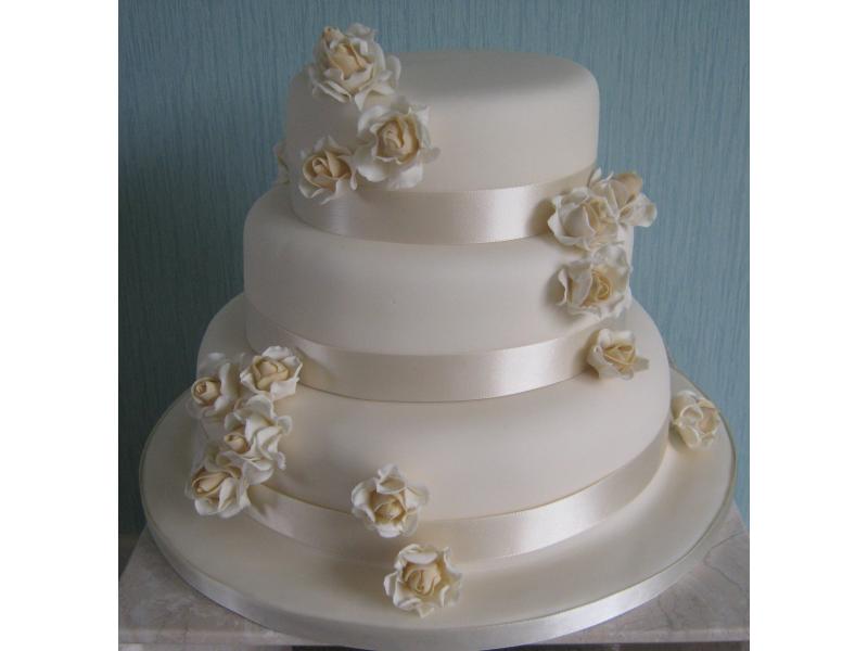 Simply Ivory 3 tier Wedding Cake in plain sponge, chocolate sponge and fruit cake for wedding at Bartle Hall
