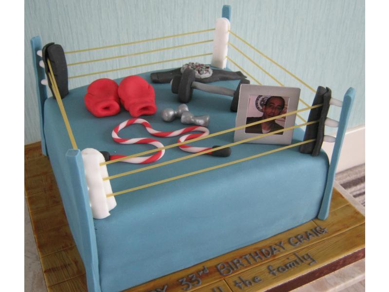 Craig in Blackpool 33rd birthday in chocolate sponge showing interests in boxing and fitness