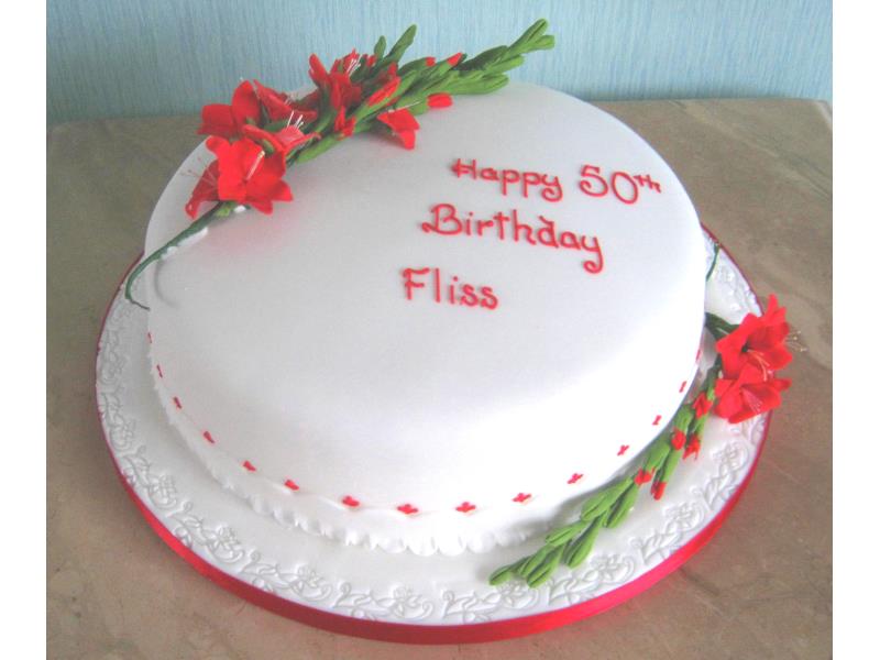 Gladioli on 50th birthday cake in chocolate sponge for Fliss celebrating at Green Drive Golf Club Lytham