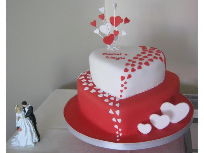 Hearts Galore wedding cake in red and white for Rachel and Wayne in Blackpool, made from plain sponge.
