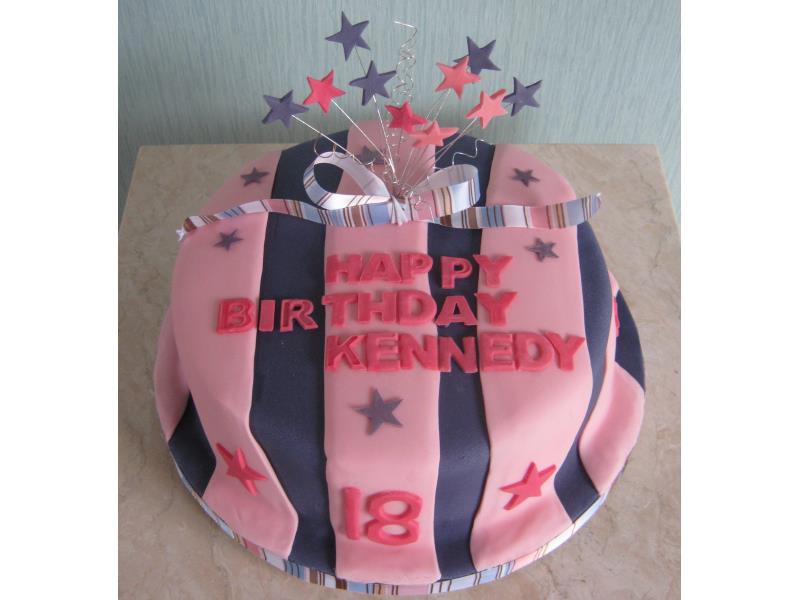 Kennedy celebrating 18th birthday in Fleetwood, starburst with pink and purple stripes in plain sponge