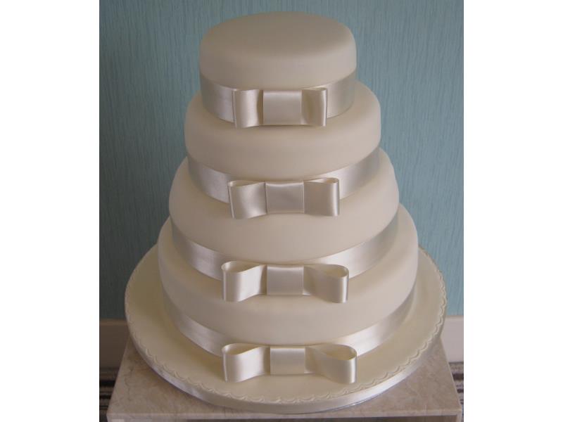 Ivory wedding cake in chocolate, vanilla and chocolate with orange sponges in Yorkshire