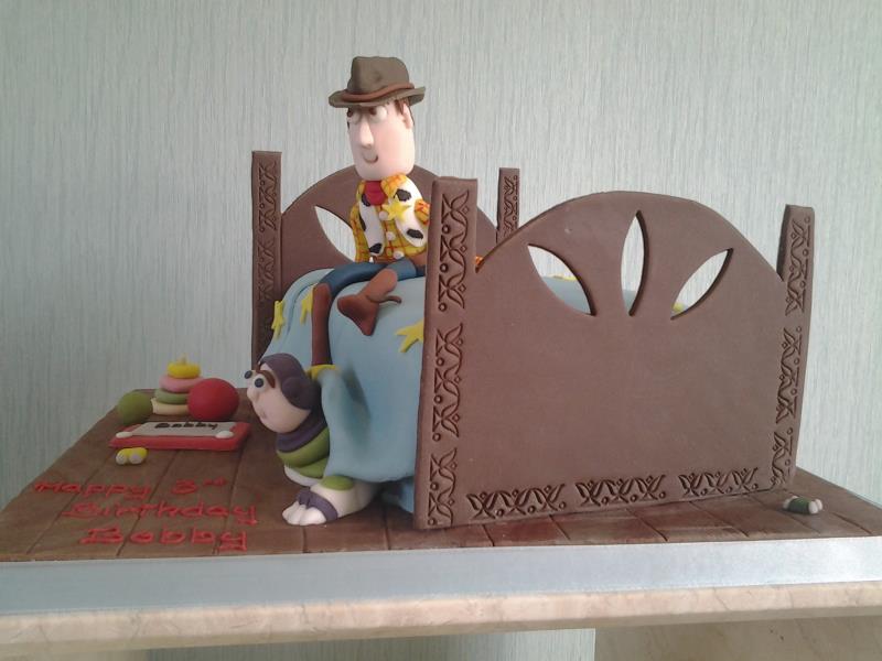 Toy Story featuring Woody for Bobby's 3rd birthday in Blackpool, made from chocolate with orange sponge