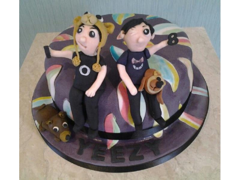 Stripes & Characters cake in Madeirafor Laura in Freckleton