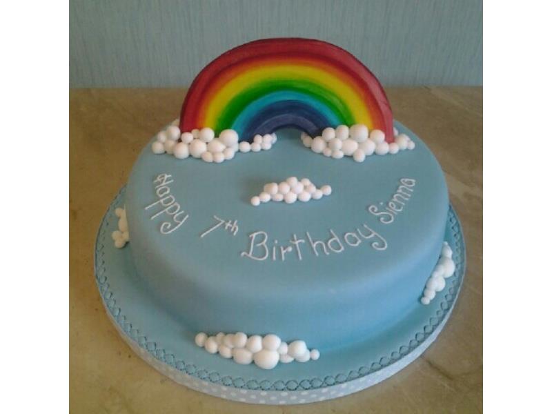 Rainbow birthday cake fo Sienna in Clevleys, made from chocolate sponge with chocolate buttercream filling