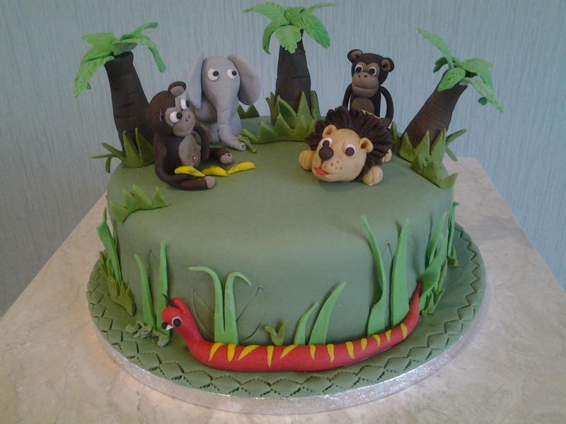 Jungle animals themed birthday cake made from chocolate sponge for Rory in Wesham