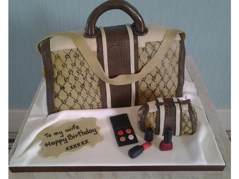 Gucci Handbag with makeup in plain sponge for wife's birthday in Lancaster
