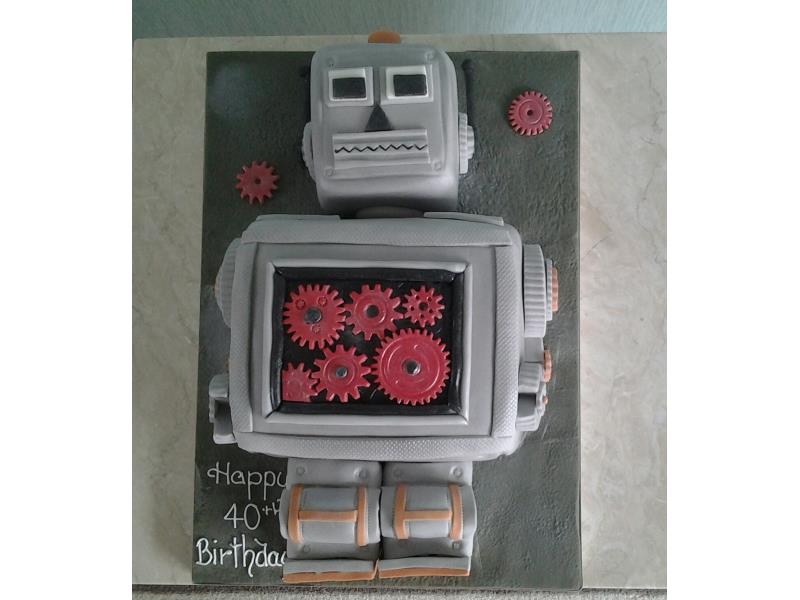 Robot cake in chocolate and orange sponge for Chantelle's partner in Blackpool