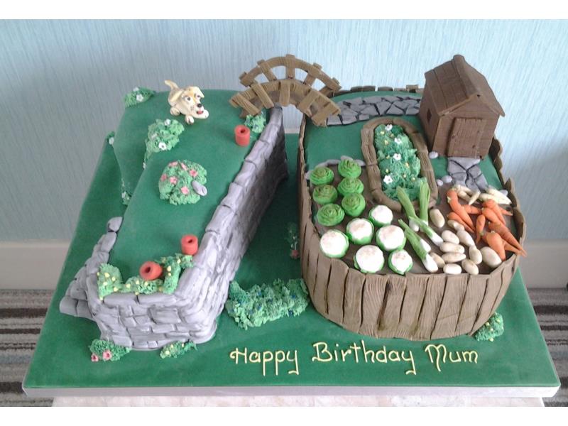 Gardening Mad - 70th birthday cake with all items handmade and edible for Cat in Lytham, made from chocolate sponge.