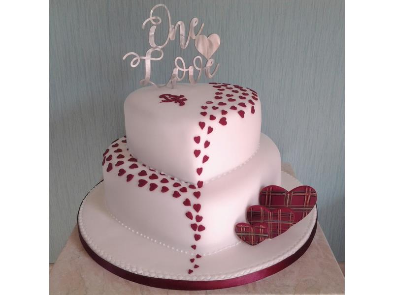 Tartan and hearts 2 tier wedding cake for Fiona & Becky from Eccles, married in Blackpool. Made from fruit cake and vanilla sponge