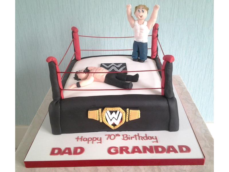 Wrestling ring and wrestlers for grandad's 70th in Preston. Made from chocolate sponge