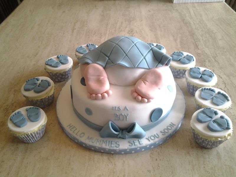 Stefi - baby shower cake in choclate with orange sponge and vanilla sponge cupcakes