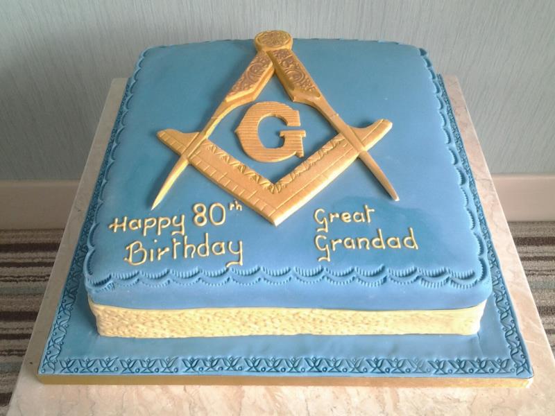 Freemason themed cake with compass and set square in chocolate sponge for David's 80th birthday in Lytham