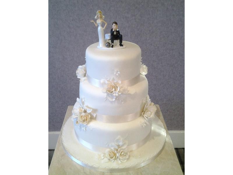 Classic 3 tier wedding cake in chocolate, carrot and chocolate with orange sponges for Zanete & Warren's wedding in Buttermere