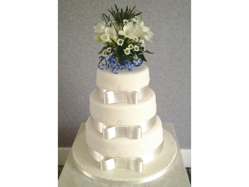 Classic white 3 tier wedding cake in vanilla and chocoolate sponges and carrot cake for Sharon & Lewis at Park Hotel Blackpool