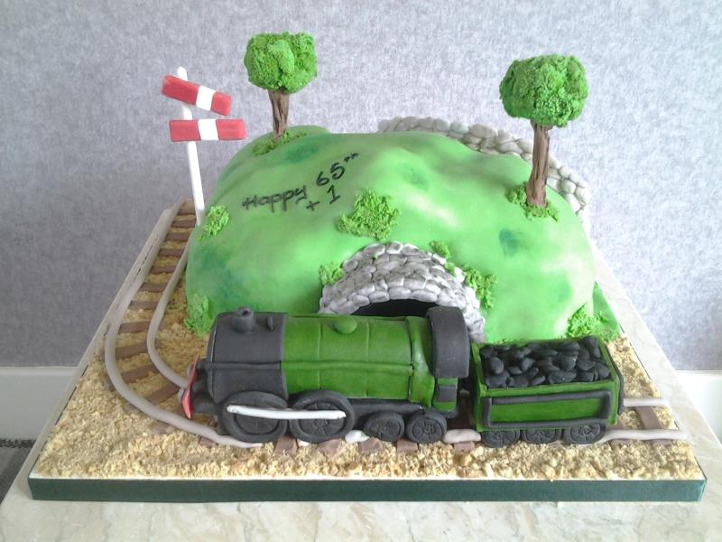 Model Railway - Poulton for Stephen's belated 65th birthday. Made from vanilla sponge and train hand modelled in sugarpaste