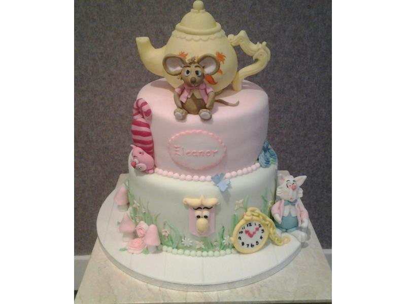 Alice in Wonderland with edible teapot, mouse, flowers etc. Cak made from vanilla and lemon sponges for Eleanor's Christeneing inn Blackpool
