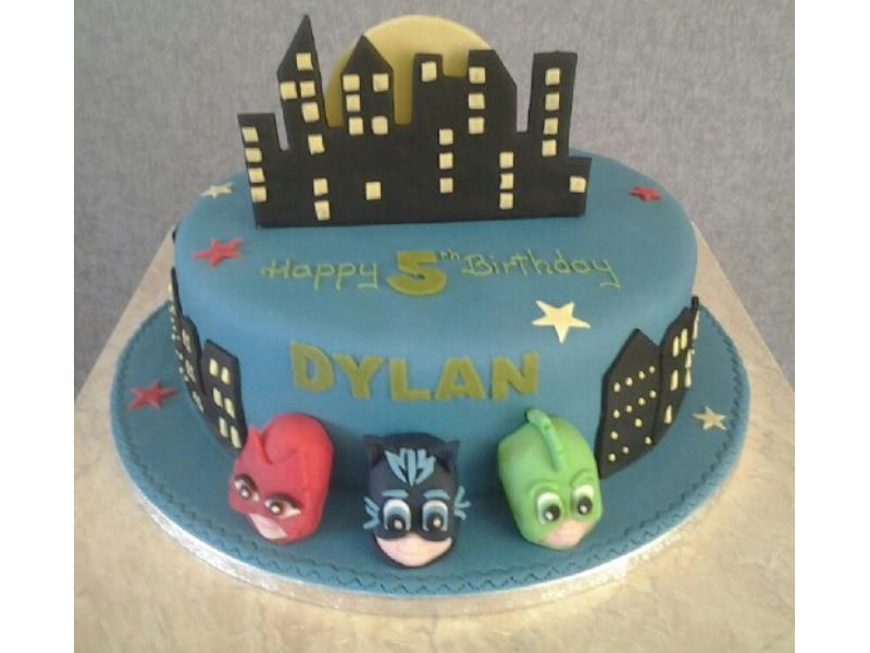 P J Masks and cityscape for Dylan's 5th birthday in Lytham St Annes. Made from chocolate sponge