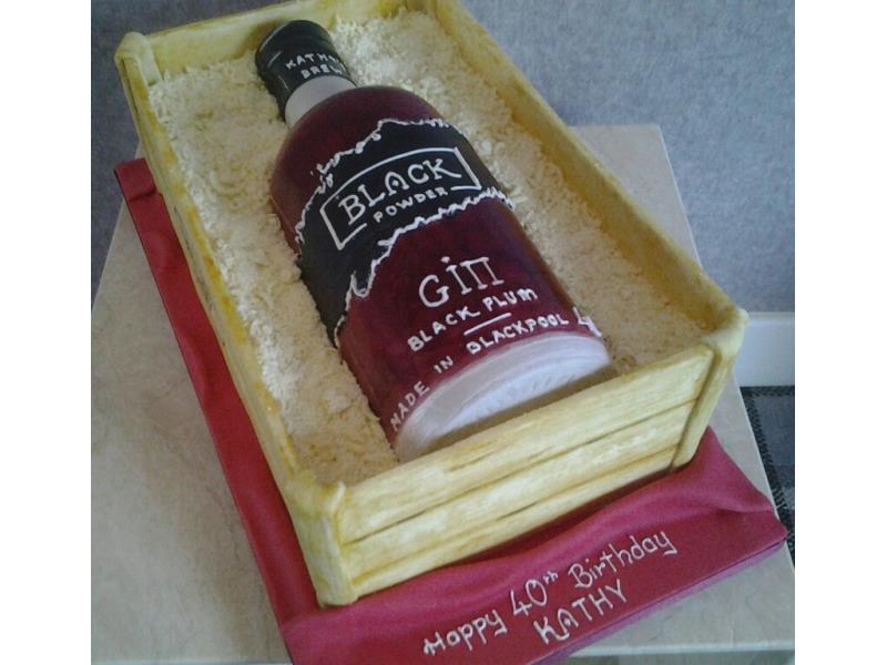 Black Powder gin bottle birthday cake