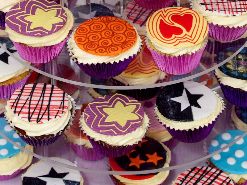 70s Theme - Close-up detail of cupcakes created for a 70s theme wedding reception